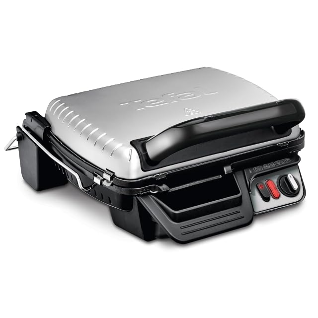 Piastra a contatto Tefal GC3060 aperta in piano con entrambe le piastre da grill